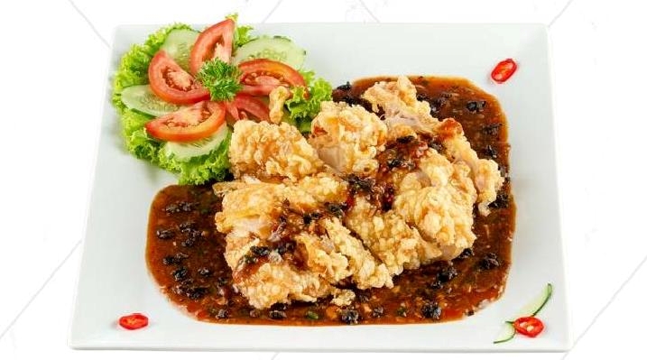 Steamed or fried chicken topped with black bean sauce
